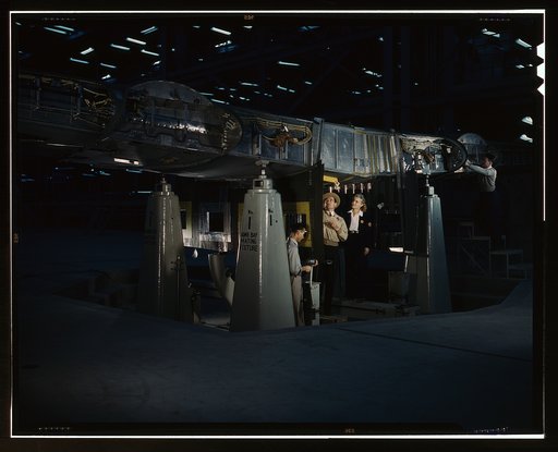 Working on the wing center section at the Consolidated Aircraft Corporation plant, Fort Worth, Texas