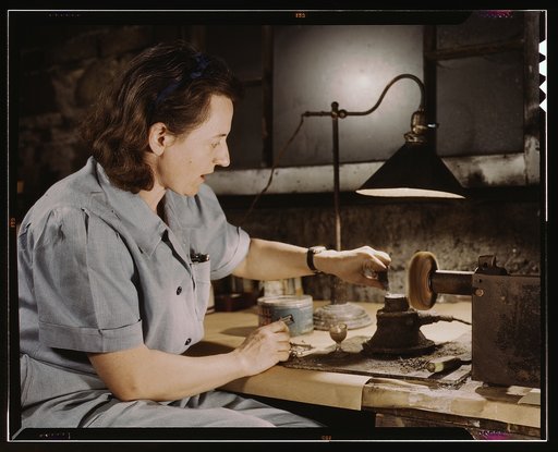 Formerly a sculptress and designer of tiles, Dorothy Cole converted her basement into a workshop to tin plate needles for valves for blood transfusion bottles prepared by Baxter Laboratories where she lives, Glenview, Ill. She turns in her profits to war bonds to provide a college education for her 