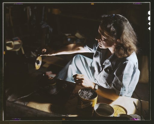 Formerly a sculptress and designer of tiles, Dorothy Cole converted her basement into a workshop to tin plate needles for valves for blood transfusion bottles prepared by Baxter Laboratories, Glenview, Ill. She turns in her profits to war bonds to provide a college education for her young nephew