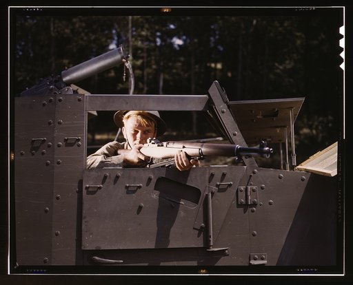 Halftrack infantryman with Garand rifle, Ft. Knox, Ky.