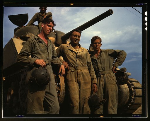 Tank crew standing in front of an M-4 tank, Ft. Knox, Ky.