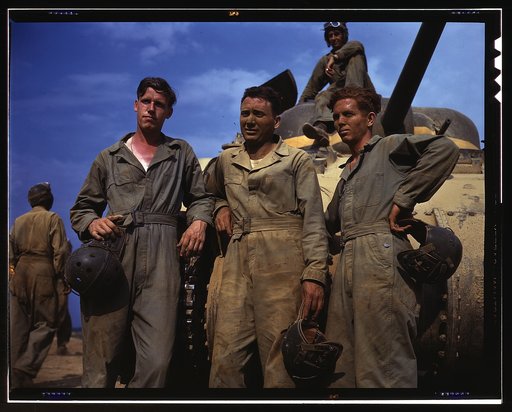 Tank crew standing in front of M-4 tank, Ft. Knox, Ky.