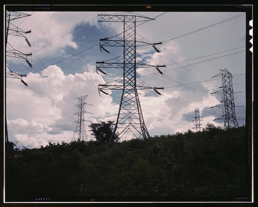 Transmission line towers and high tension lines that carry current generated at TVA's Wilson Dam hydroelectric plant, near Sheffield, Ala.