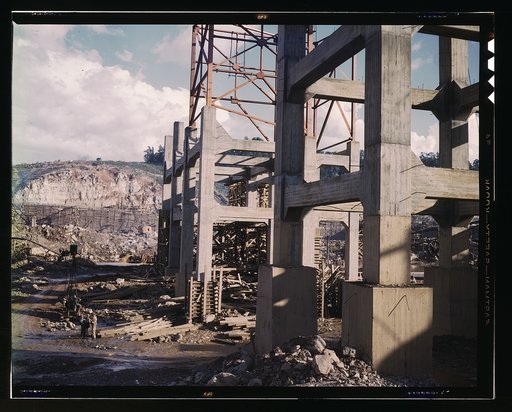 Early stage of construction work at the TVA's Douglas Dam, Tenn. In the background is a log coffer dam