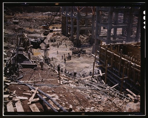 Excavating within the log cofferdam during an early stage of construction, Douglas Dam, Tenn.