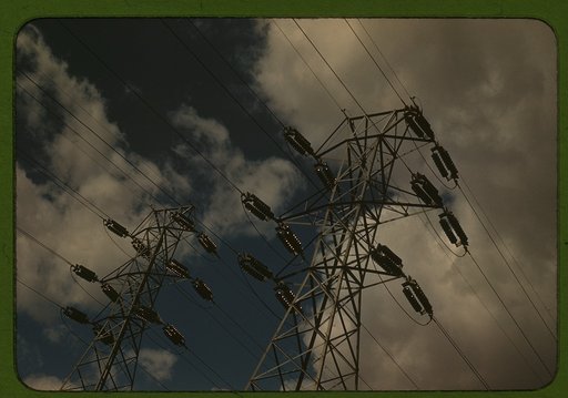Insulators and transmission wires in the switchyard of the TVA's Chickamauga Dam, located near Chattanooga, 471 miles above the mouth of the Tennessee River. The [dam] has an authorized power installation of 81,000 kw. The reservoir at the dam adds 377,000 acre-feet of water to controlled storage on