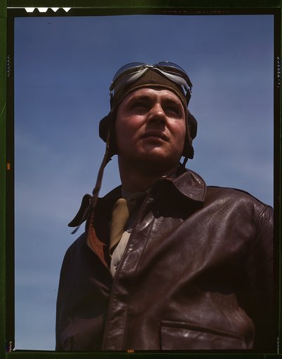 The kind of man Hitler wishes we didn't have. A bomber pilot, captain in a bombardment squadron, just before he climbs aboard his huge YN-17 bombing plane