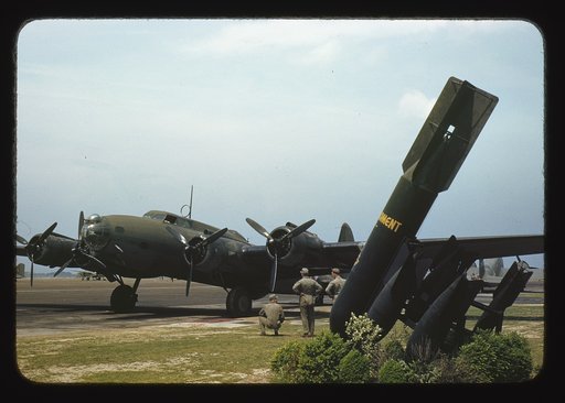 One of America's new warships of the air, a mighty YB-17 bomber, is pulled up at a bombardment squadron hangar, Langley Field, Va. It is all set to taxi out to a runway and take off