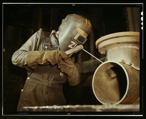Welder making boilers for a ship, Combustion Engineering Co., Chattanooga, Tenn.