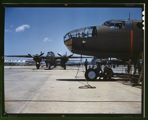 New B-25 bombers lined up for final inspection and tests at the flying field of an aircraft plant, North American Aviation, Inc., Calif. It performs at the 25,000-foot ceiling