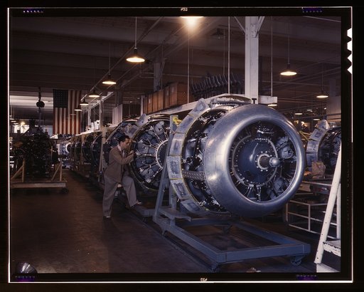 Cowling and control rods are added to motors for North American B-25 bombers as they move down the assembly line, N[orth] A[merican] Aviation, Inc., Inglewood, Calif.