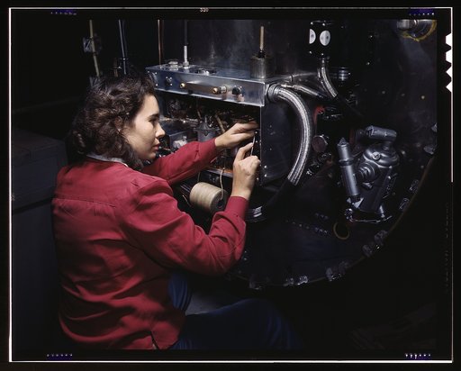 Switch boxes on the firewalls of B-25 bombers are assembled by women workers at North American [Aviation, Inc.]'s Inglewood, Calif., plant
