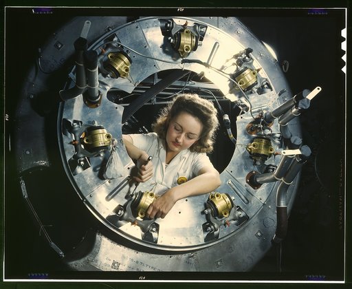 Part of the cowling for one of the motors for a B-25 bomber is assembled in the engine department of North American [Aviation, Inc.]'s Inglewood, Calif., plant