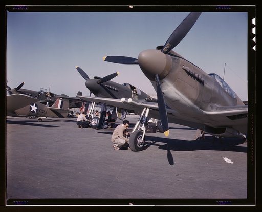 P-51 ("Mustang") fighter planes being prepared for test flight at the field of the North American Aviation, Inc., plant in Inglewood, Calif.