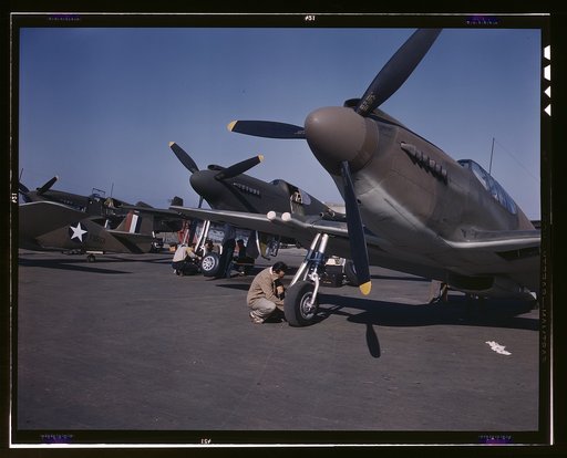 P-51 ("Mustang") fighter planes being prepared for test flight at the field of North American Aviation, Inc., plant in Inglewood, Calif.