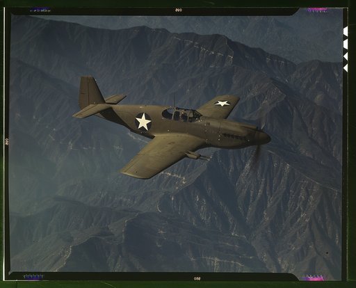 P-51 "Mustang" fighter in flight, Inglewood, Calif. The "Mustang", built by North American Aviation, Incorporated, is the only American-built fighter used by the Royal Air Force of Great Britain