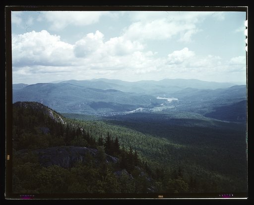 A view looking northeast from the fire tower manned by Barbara Mortensen, a fire and airplane lookout on Pine Mountain, Gorham vicinity, N.H.