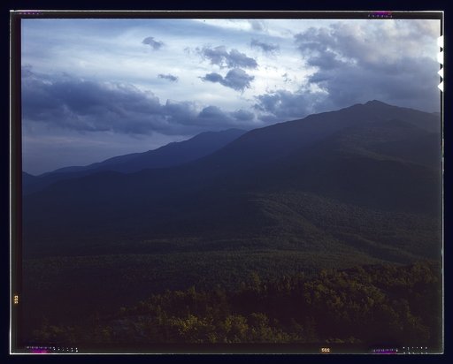 A view looking through the White Mountains from the fire control tower manned by Barbara Mortensen, a fire and airplane lookout on Pine Mountain, Gorham vicinity, N.H. View is to the south