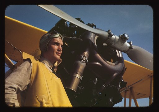 Marine lieutenant by the power plane which tows the training gliders at Page Field, Parris, Island, S.C.