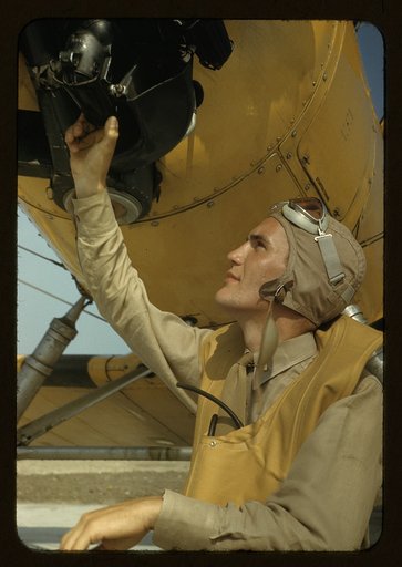 Marine lieutenant, pilot with the power towing plane for the training gliders at page Field, Parris Island, S.C.