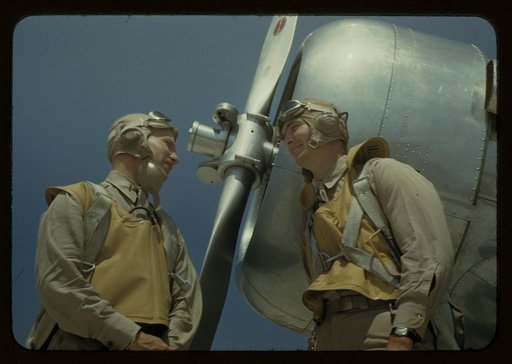 Marine lieutenants, pilots, by the power tow-plane for the training gliders at Parris Island's Page Field, S.C.