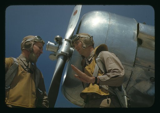 Marine lieutenants, pilots, by the power tow-plane for the training gliders at Page Field, Parris Island, S.C.