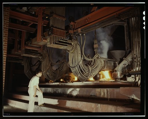 A large electric phosphate smelting furnace used in the making of elemental phosphorus in a TVA chemical plant in the Muscle Shoals area, Alabama