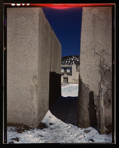 A Spanish-American village in the foothills of the Sangre de Cristo Mountains dating back to 1700 which was once a sheep raising center, Trampas, Taos County, New Mexico. Due to the over-grazing and loss of range title, its inhabitants now work as migratory labor and at subsistence farming