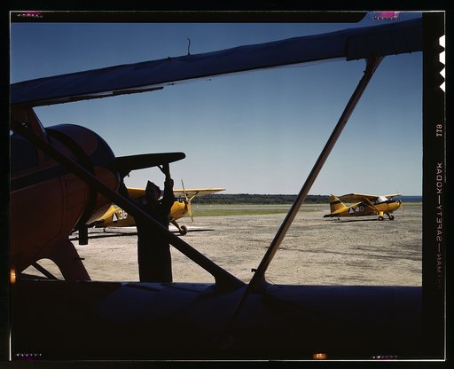 Civil Air Patrol Base, Bar Harbor, Maine. Ground crew making overhaul of a patrol plane. Coastal Patrol #20