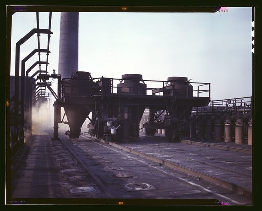 Coal feeders on tip of coke ovens, Hanna furnaces of the Great Lakes Steel Corporation, Detroit, Mich.