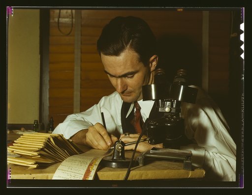 Geologist examining cuttings from wildcat well, Amarillo, Texas