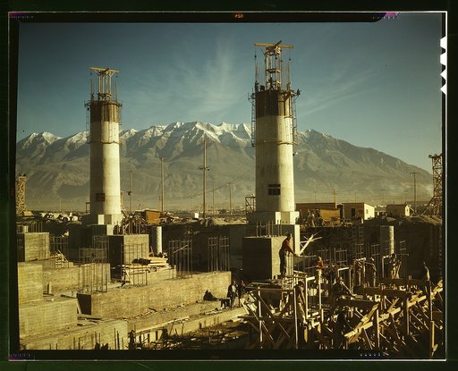 Partly finished open hearth furnaces and stacks for a steel mill under construction which will soon be producing vitally needed steel, Columbia Steel Co., Geneva, Utah