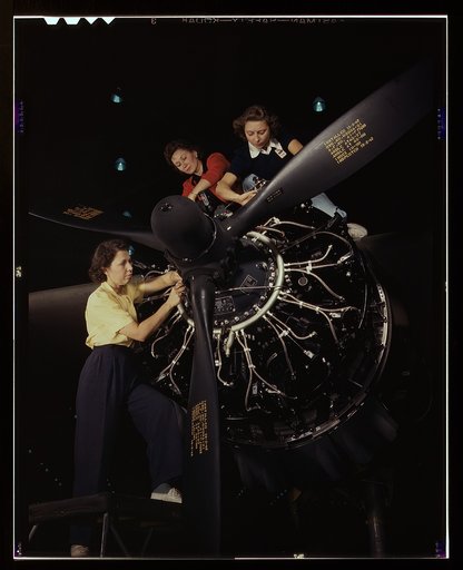 The careful hands of women are trained in precise aircraft engine installation duties at Douglas Aircraft Company, Long Beach, Calif.