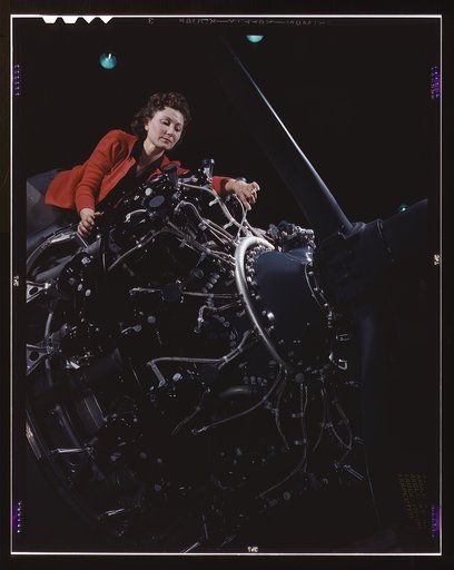 Woman at work on motor, Douglas Aircraft Company, Long Beach, Calif.
