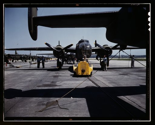 A fast, hard-hitting new A-20 [i.e., B-25] attack bomber is brought for a test hop to the flight line at the Long Beach, Calif., plant of Douglas Aircraft Company