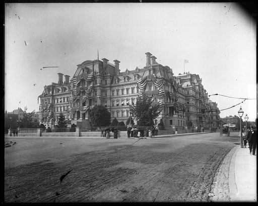 State, War & Navy Building decorated with flags, from south, in the 1890's