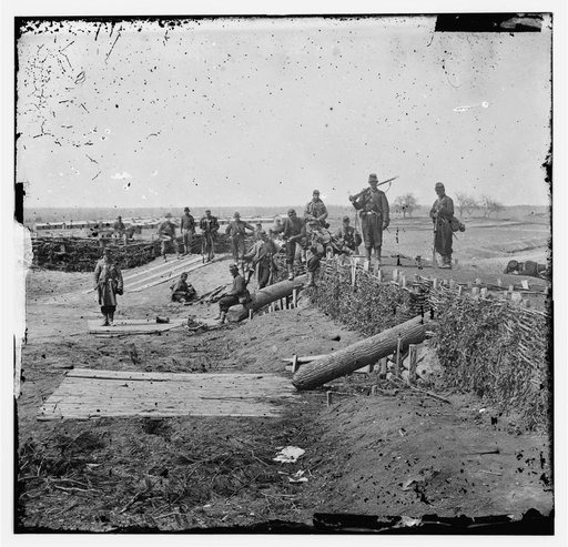 Group of Federal soldiers in Confederate fort on heights of Centreville with Quaker guns