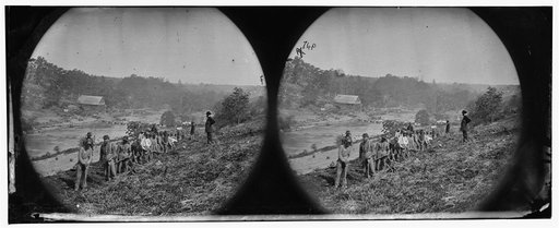 Jericho Mills, Va. Party of the 50th New York Engineers building a road on the south bank of the North Anna, with a general headquarters wagon train crossing the pontoon bridge