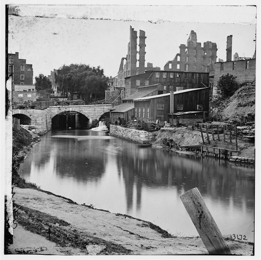 Richmond, Va. View on James River and Kanawha Canal near the Haxall Flour Mills; ruins of the Gallego Mills beyond