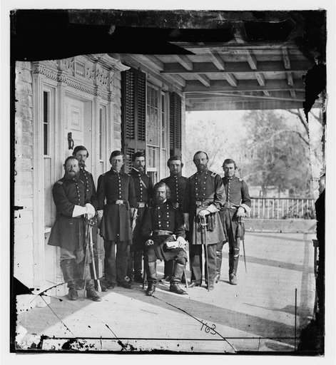Beaufort, S.C. Gen. Isaac I. Stevens (seated) and staff on porch of a house
