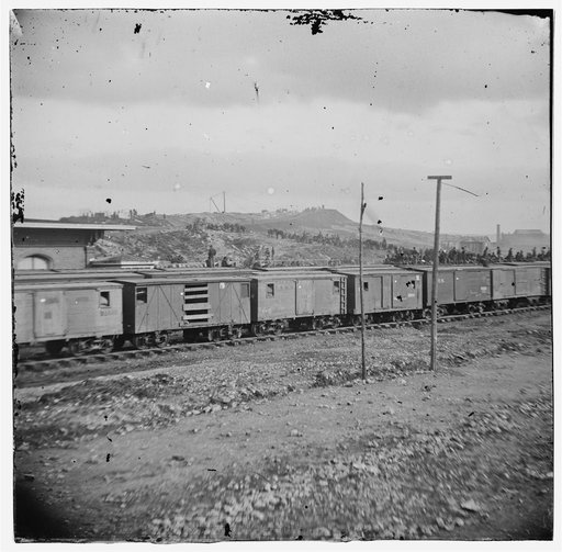 Chattanooga, Tenn. Boxcars and depot with Federal cavalry guard beyond
