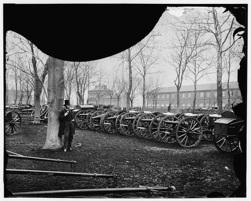 Washington, D.C. Park of Wiard guns at the Arsenal; another view. H.L. Stuart against tree