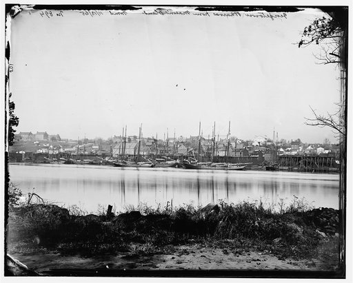Washington, D.C. Georgetown waterfront with sailing vessels, seen from Mason's Island