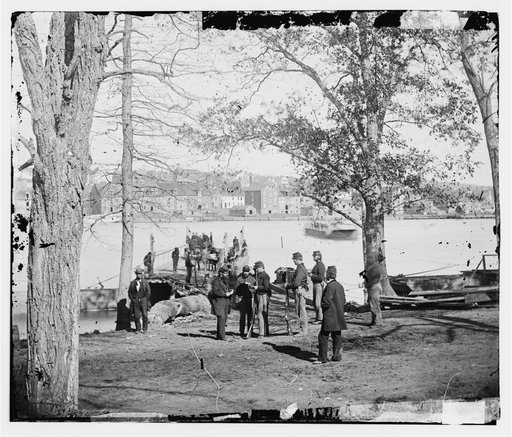 Washington, D.C. Guards at ferry landing on Mason's Island examining a pass