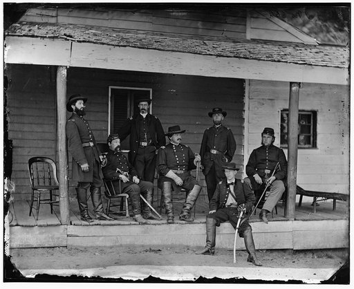 Washington, D.C. Maj. Gen Alexander M. McCook (center) and staff on porch of quarters, Brightwood (7th Street Road near present Sheridan St.