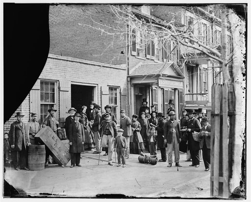 Washington, D.C. Maimed soldiers and others before office of U.S. Christian Commission