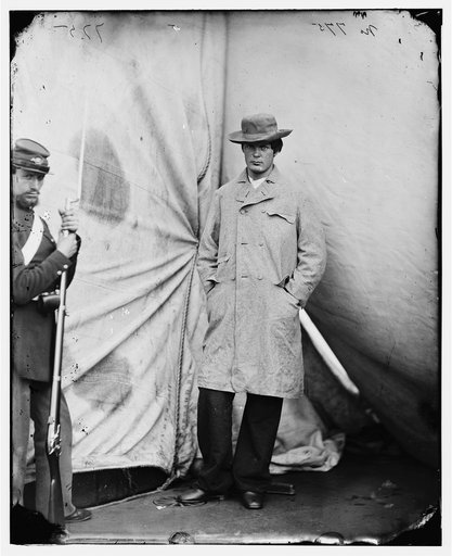 Washington Navy Yard, D.C. Lewis Payne, the conspirator who attacked Secretary Seward, standing in overcoat and hat