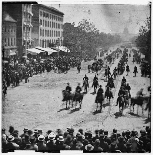 Washington, D.C. Mounted officers and unidentified units passing on Pennsylvania Avenue near the Treasury