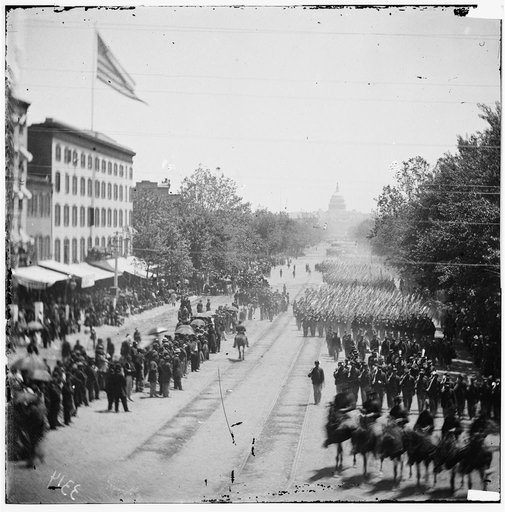 Washington, D.C. Infantry units with fixed bayonets passing on Pennsylvania Avenue near the Treasury