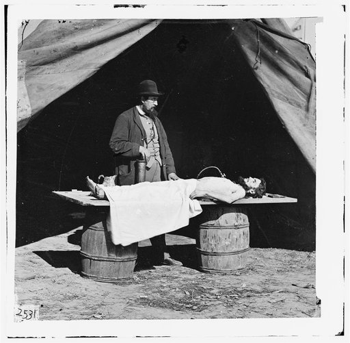 Dr. Richard Burr, an embalming surgeon in the Army of the James demonstrating the procedure on a dead soldier
